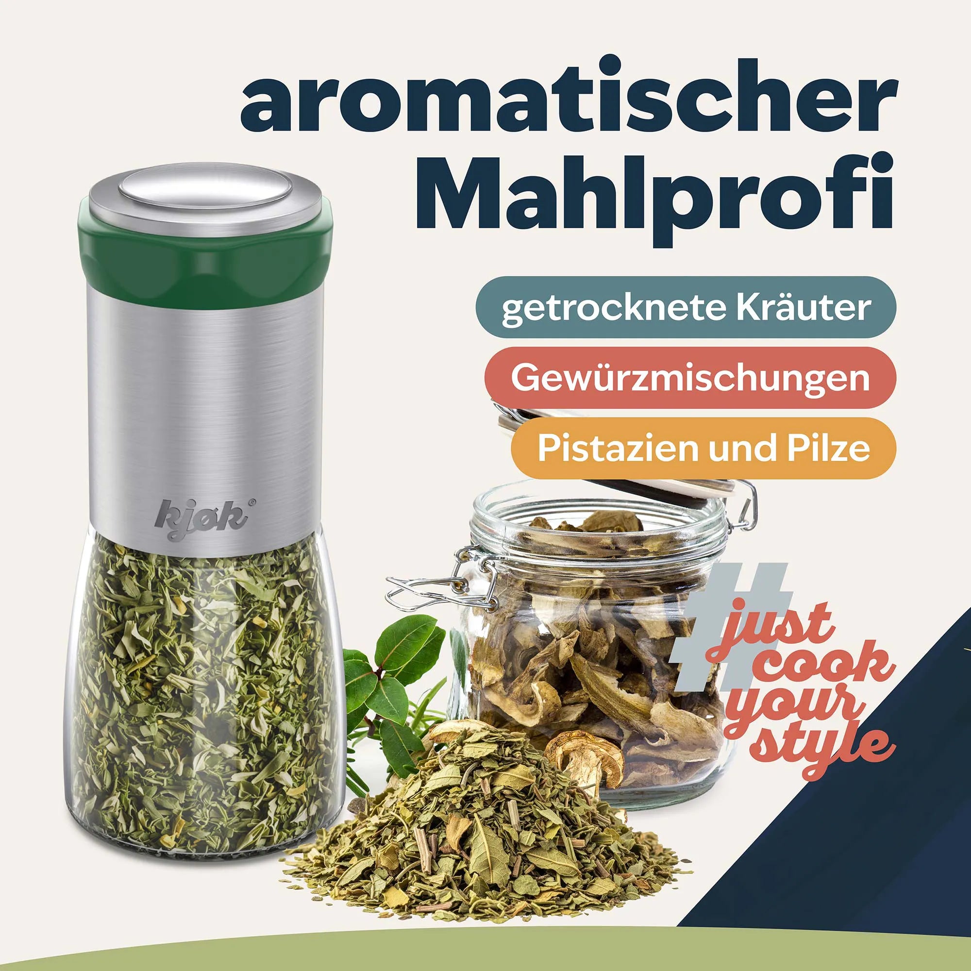 Kräutermühle aus Edelstahl und Glas mit grünem Ring, gefüllt mit getrockneten Kräutern für intensives Aroma